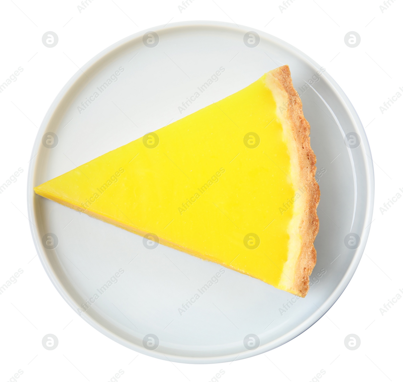 Photo of Plate with slice of delicious homemade lemon pie on white background, top view