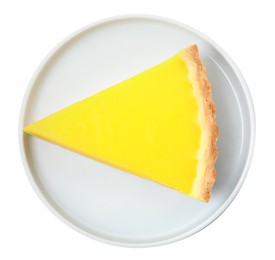 Photo of Plate with slice of delicious homemade lemon pie on white background, top view