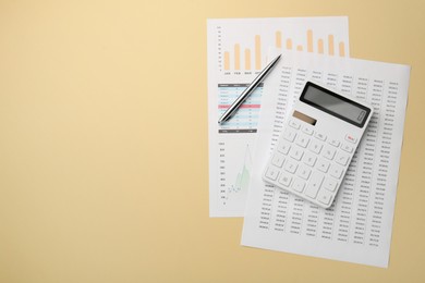 Photo of Accounting documents, calculator and pen on beige background, top view. Space for text