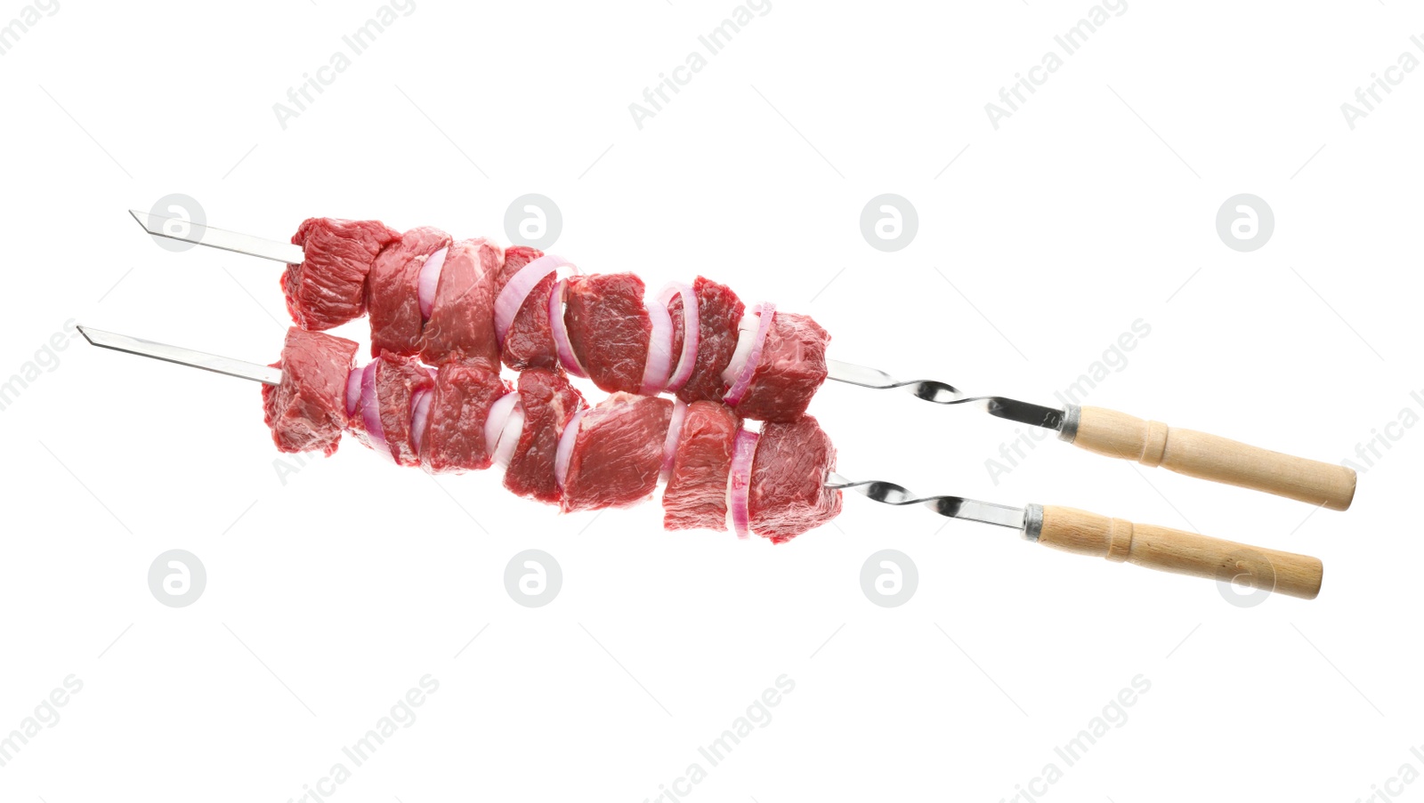 Photo of Metal skewers with raw meat and onion on white background