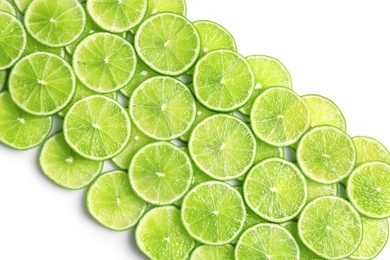 Fresh sliced ripe limes on white background, top view