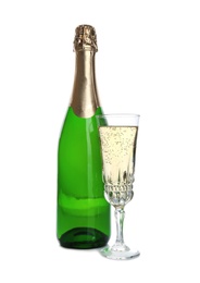 Photo of Bottle and glass with champagne on white background. Festive drink