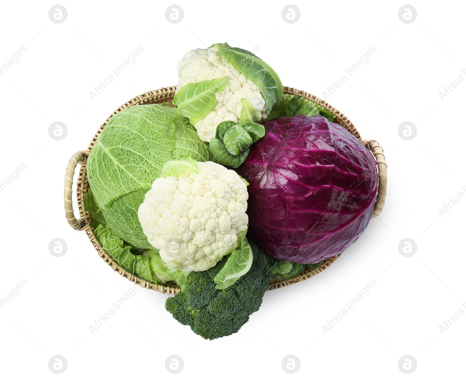 Photo of Wicker tray with different types of fresh cabbage on white background, top view