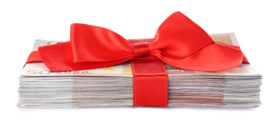 Photo of Euro banknotes tied with red ribbon isolated on white. Money and finance