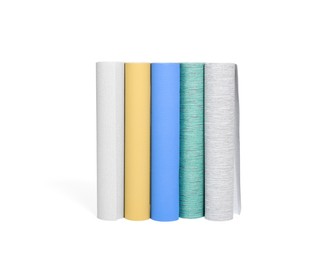 Different colorful wallpaper rolls isolated on white