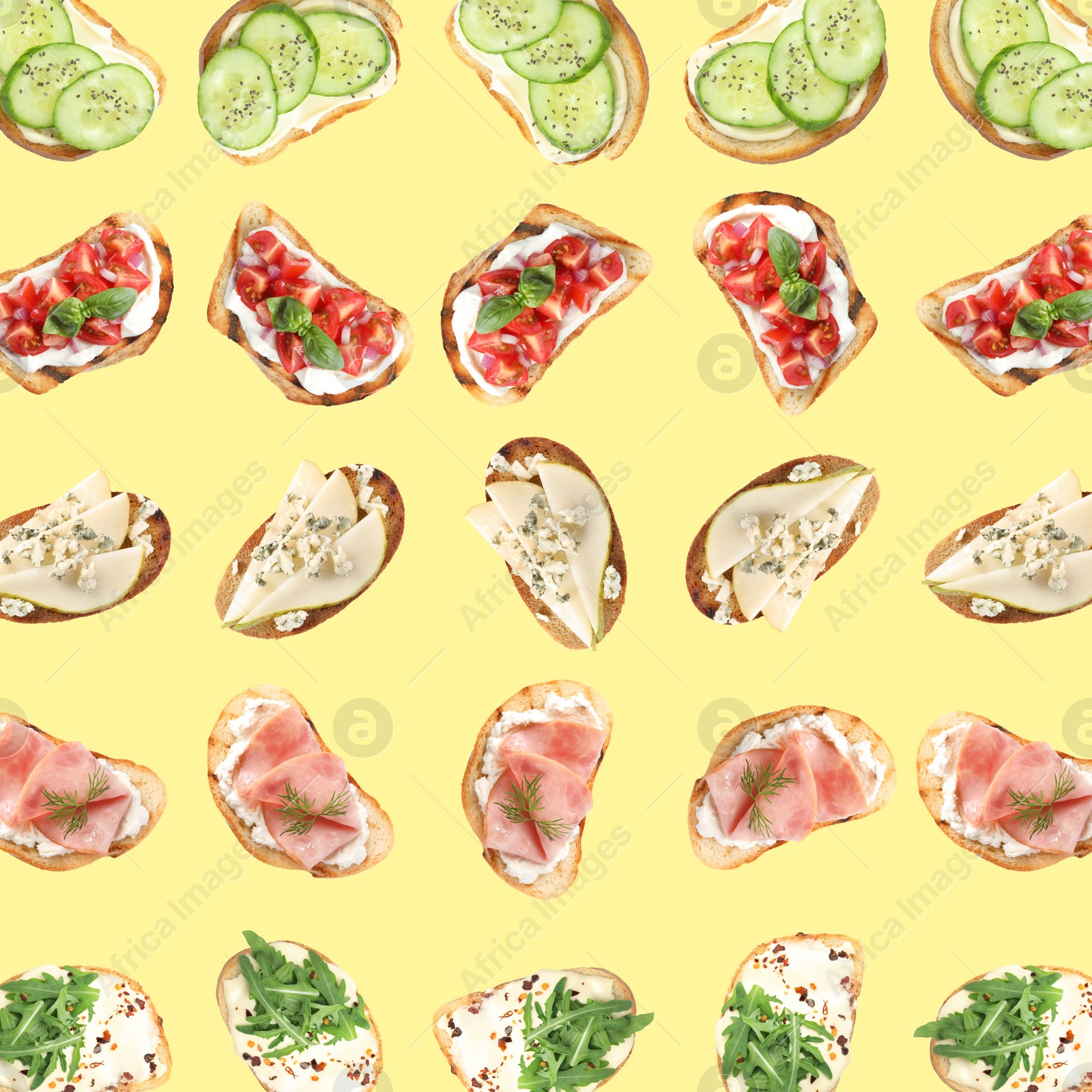 Image of Set of delicious toasted bread with different toppings on yellow background, top view