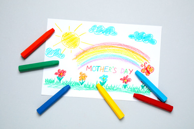 Drawing for Mother's day and crayons on light grey background, flat lay