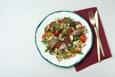 Delicious salad with beef tongue, grilled vegetables, peach and blue cheese on white table, flat lay. Space for text