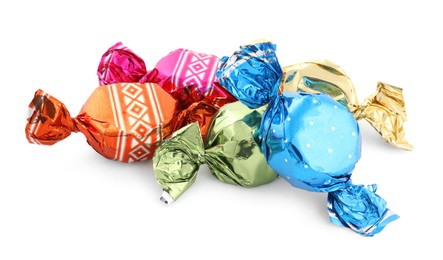 Photo of Sweet candies in colorful wrappers on white background