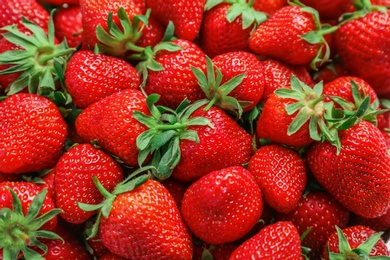 Many ripe red strawberries as background, closeup