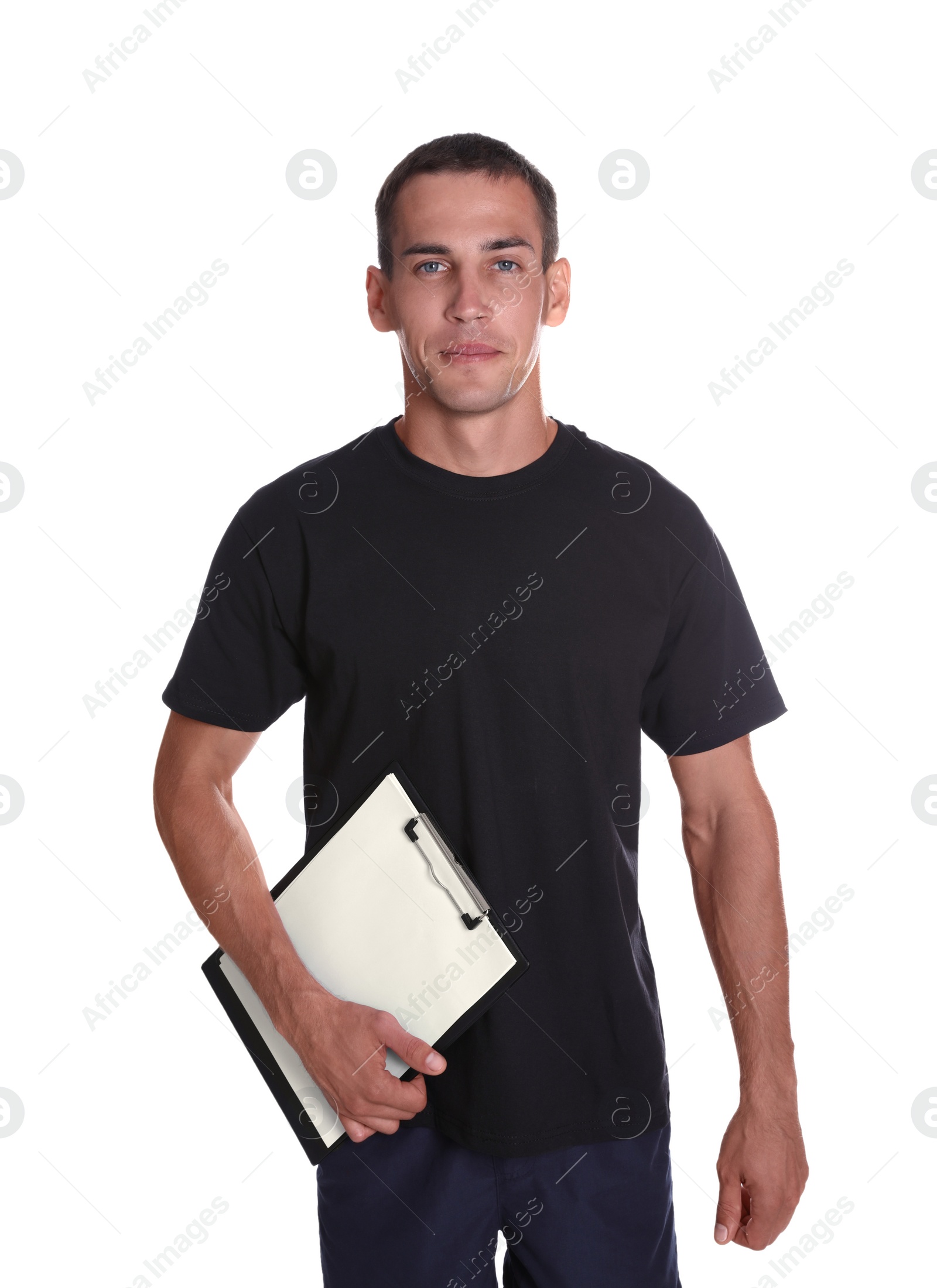 Photo of Portrait of personal trainer with clipboard on white background. Gym instructor