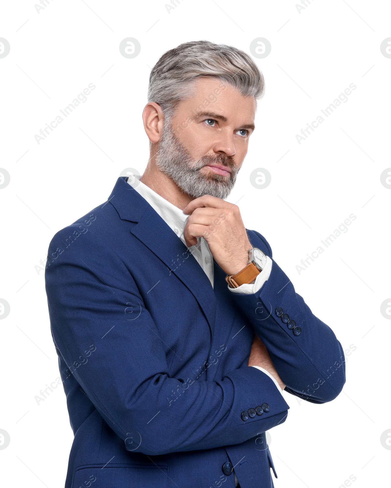 Photo of Mature businessman in stylish clothes posing on white background