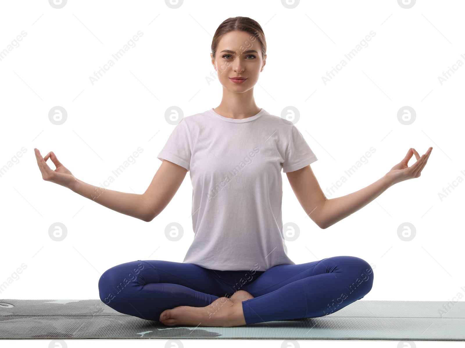 Photo of Beautiful young woman meditating on white background