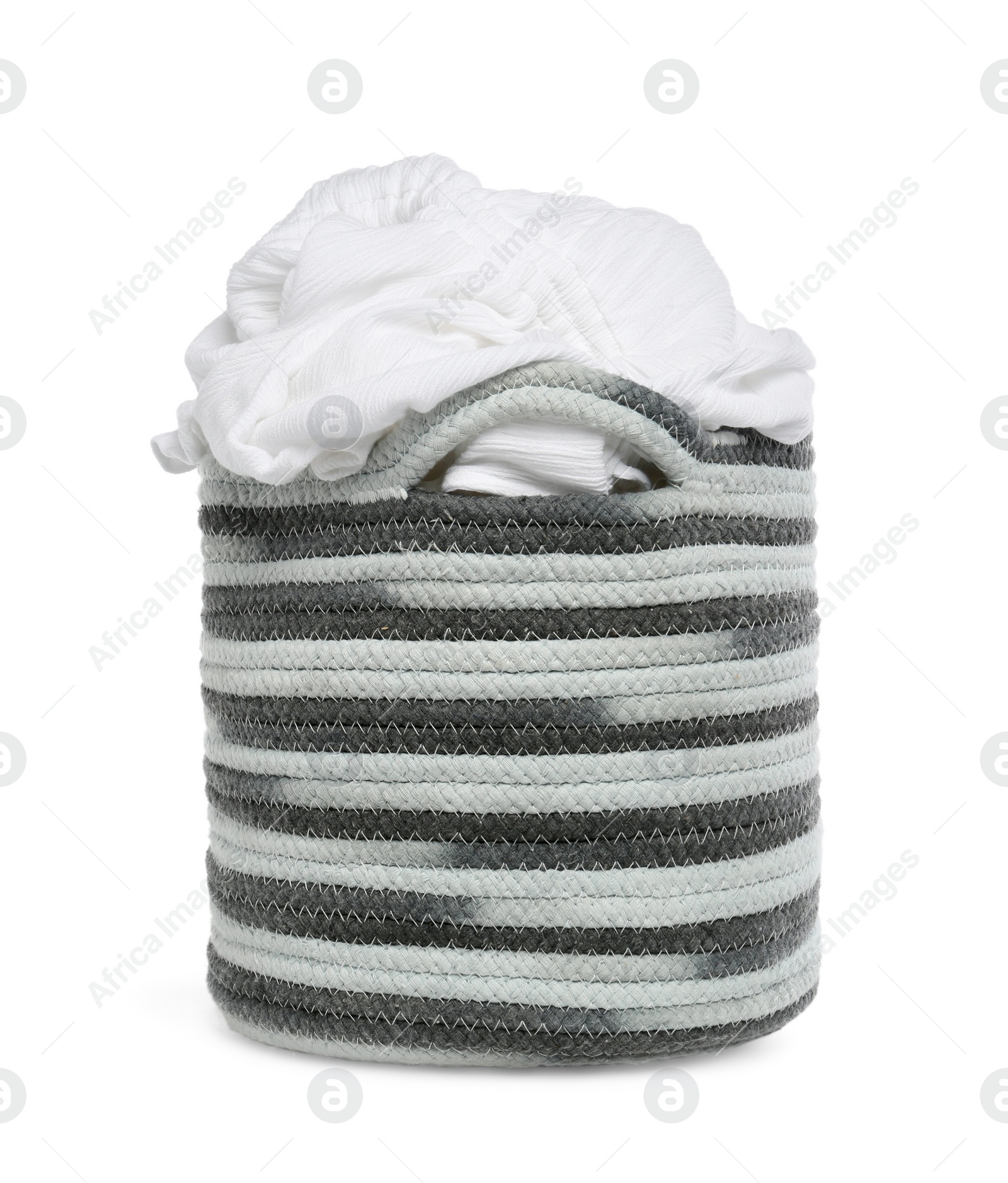 Laundry basket with clothes isolated on white Photo of Laundry basket with clothes isolated on white