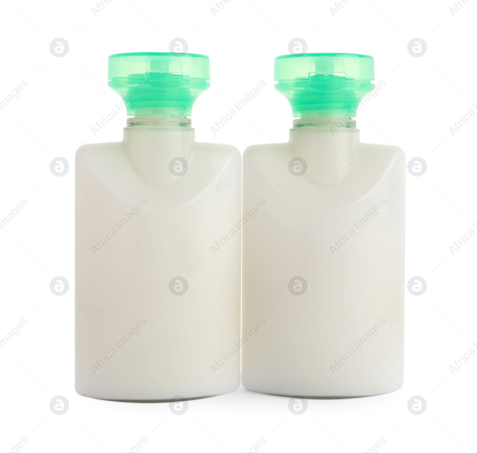 Photo of Mini bottles of cosmetic products isolated on white