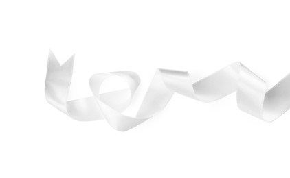 Photo of Satin ribbon on white background, top view