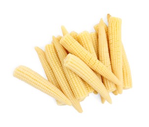 Photo of Fresh baby corn cobs on white background, top view