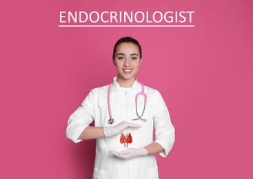 Image of Endocrinologist holding thyroid illustration on pink background