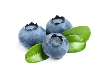 Photo of Fresh ripe blueberries with leaves on white background