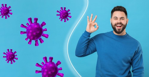 Man with strong immunity surrounded by viruses on light blue background, banner design