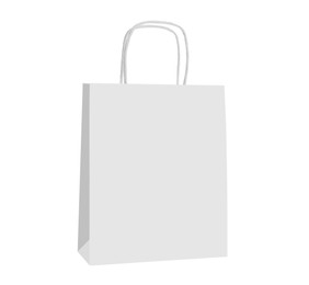 Photo of Blank paper bag isolated on white. Mockup for design