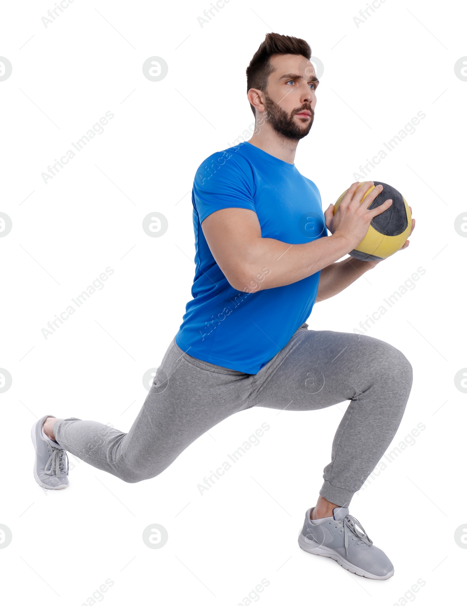 Photo of Athletic man doing exercise with medicine ball isolated on white