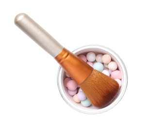 Photo of Powder balls with makeup brush on white background