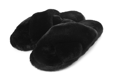 Photo of Pair of black fluffy slippers isolated on white