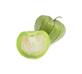 Photo of Fresh green tomatillos with husk isolated on white