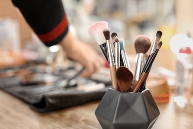 Photo of Holder with makeup brushes, closeup