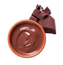 Photo of Tasty milk chocolate paste in bowl and pieces isolated on white, top view