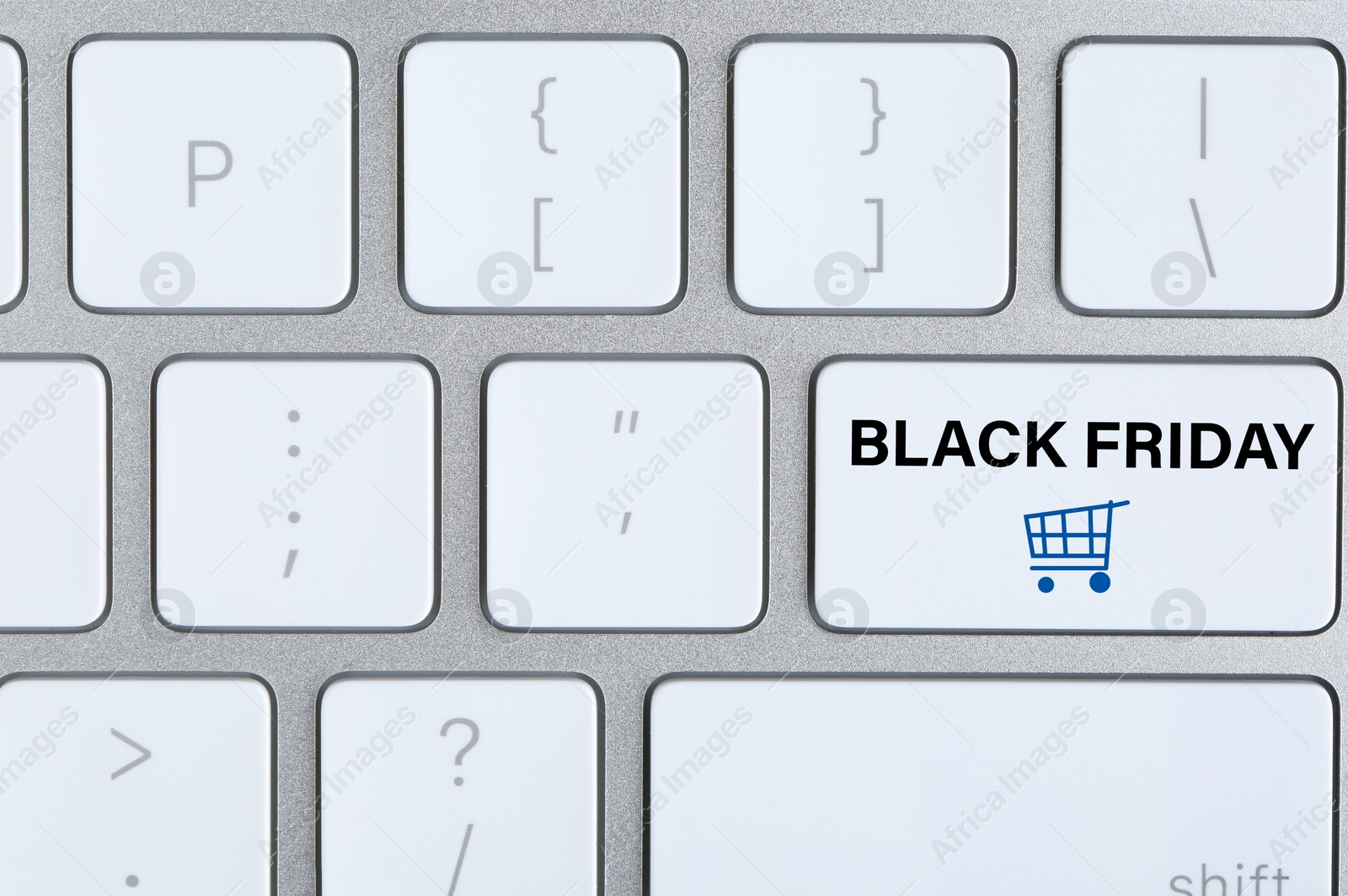 Image of Computer keyboard with Black Friday button, closeup. Online shopping 
