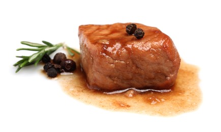 Photo of Piece of delicious cooked beef, rosemary and peppercorns isolated on white. Tasty goulash