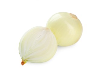 Whole and cut onions on white background