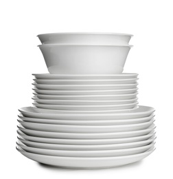 Photo of Stack of ceramic dishware on white background