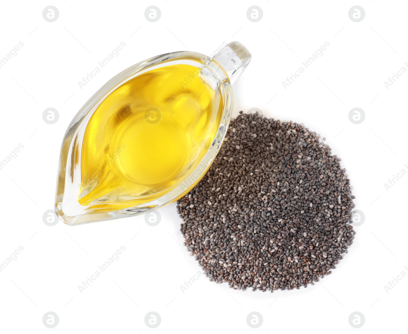 Photo of Sauce boat with oil and chia seeds isolated on white, top view