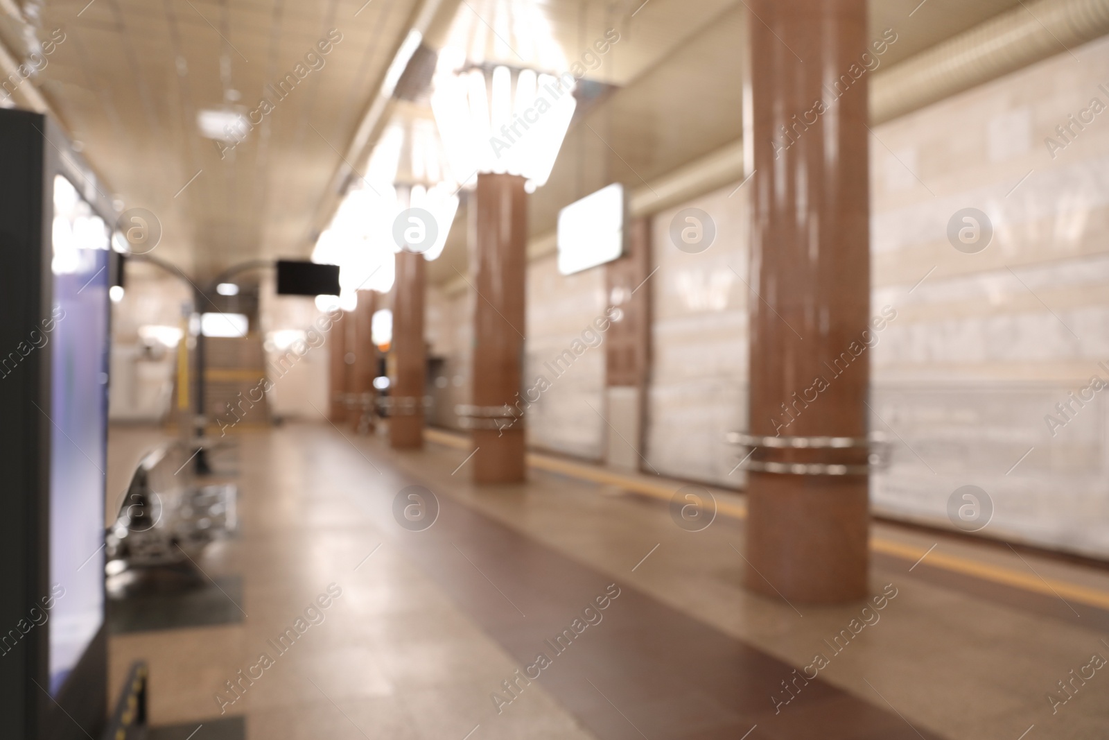 Photo of Blurred view of subway station. Public transport