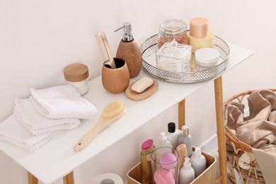 Different bath accessories and personal care products indoors