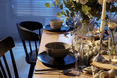 Festive table setting with beautiful tableware and decor indoors