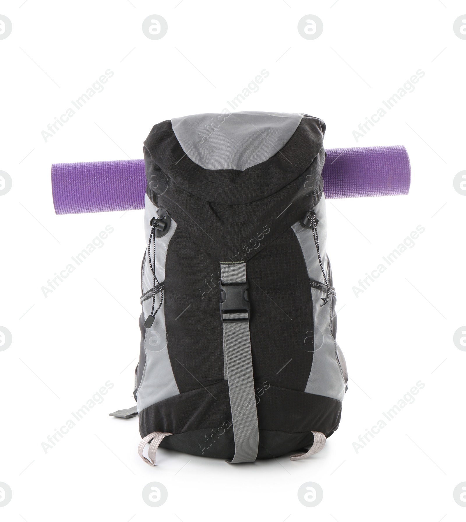 Photo of Camping backpack and mat on white background