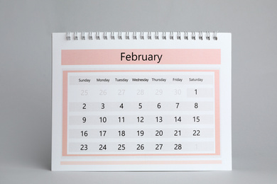 Paper calendar on grey background. Planning concept