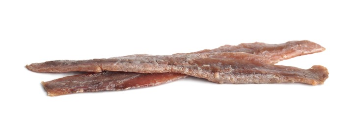 Delicious salted anchovy fillets on white background