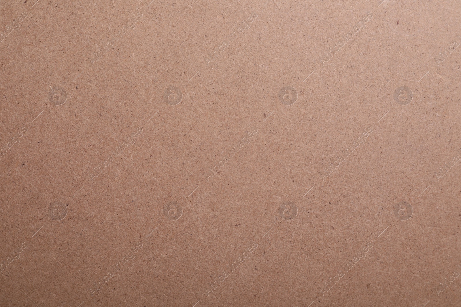 Photo of Texture of kraft paper bag as background, closeup