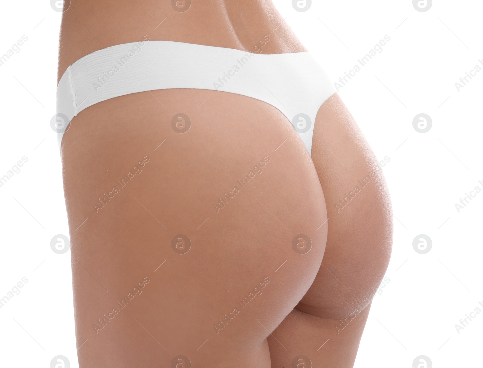 Photo of Young woman in underwear on white background, closeup. Beauty and body care