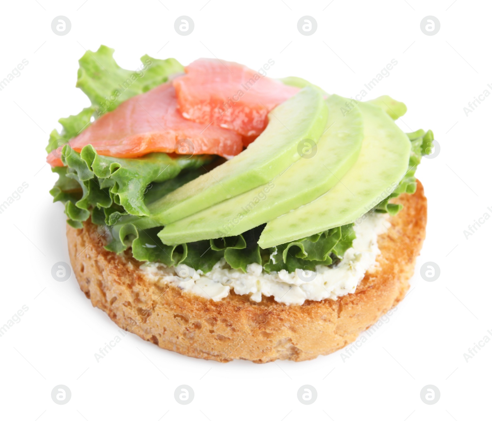 Photo of Tasty rusk with salmon, cream cheese and avocado isolated on white