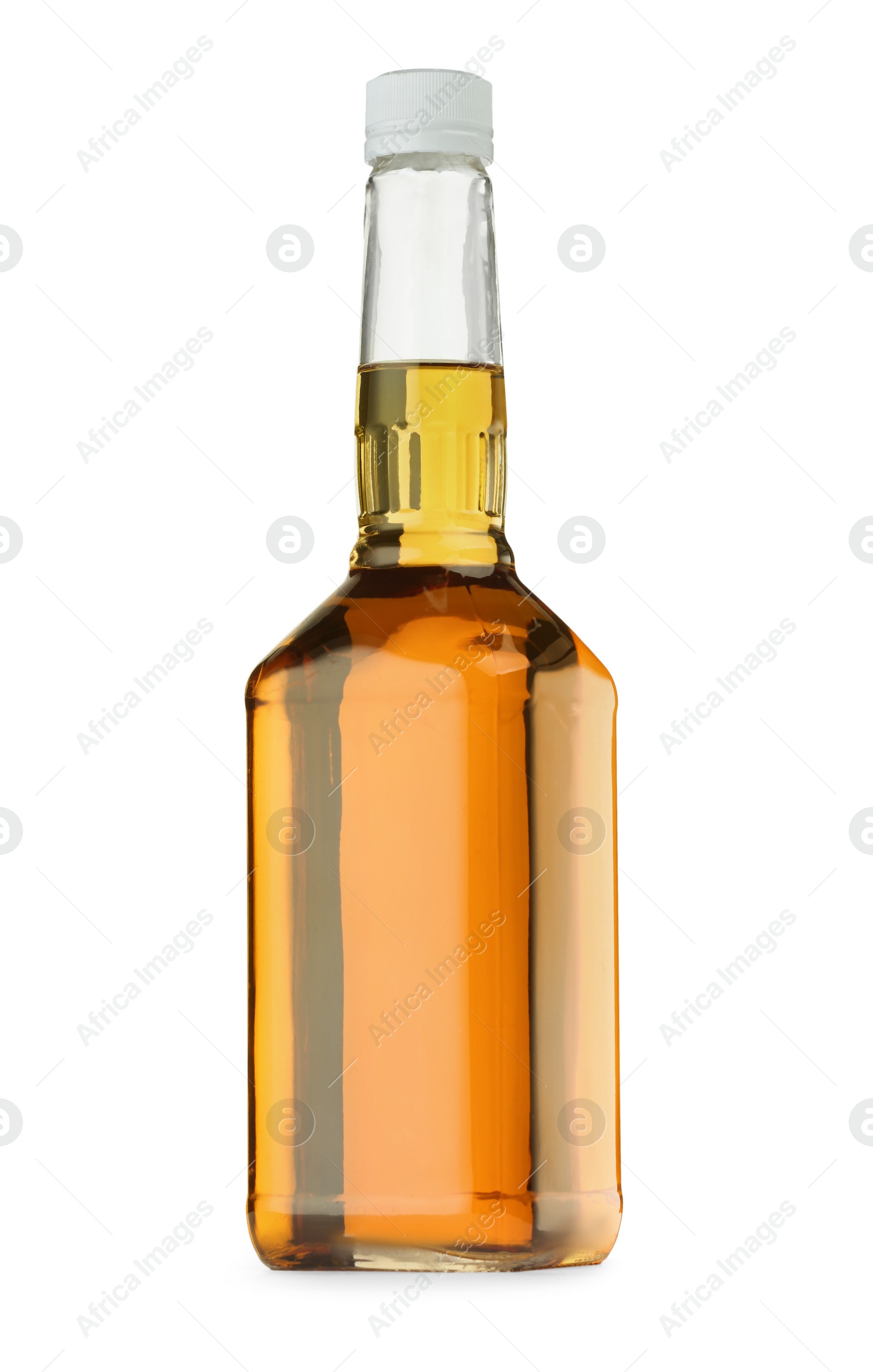 Photo of Whiskey in glass bottle isolated on white