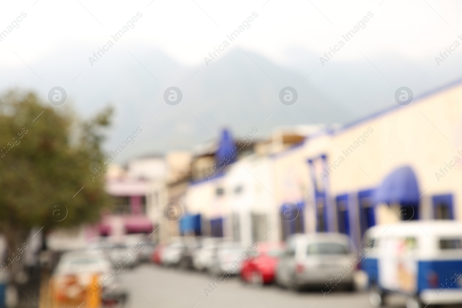 Photo of San Pedro Garza Garcia, Mexico – February 8, 2023: Blurred view of street with cars and beautiful buildings