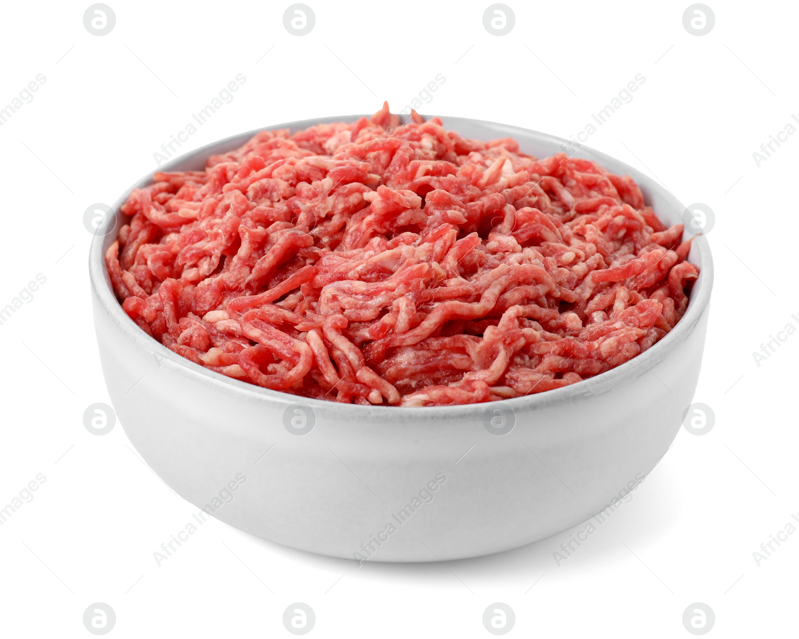 Photo of Raw ground meat in bowl isolated on white