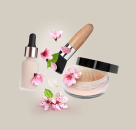 Image of Spring flowers and makeup products in air on beige background