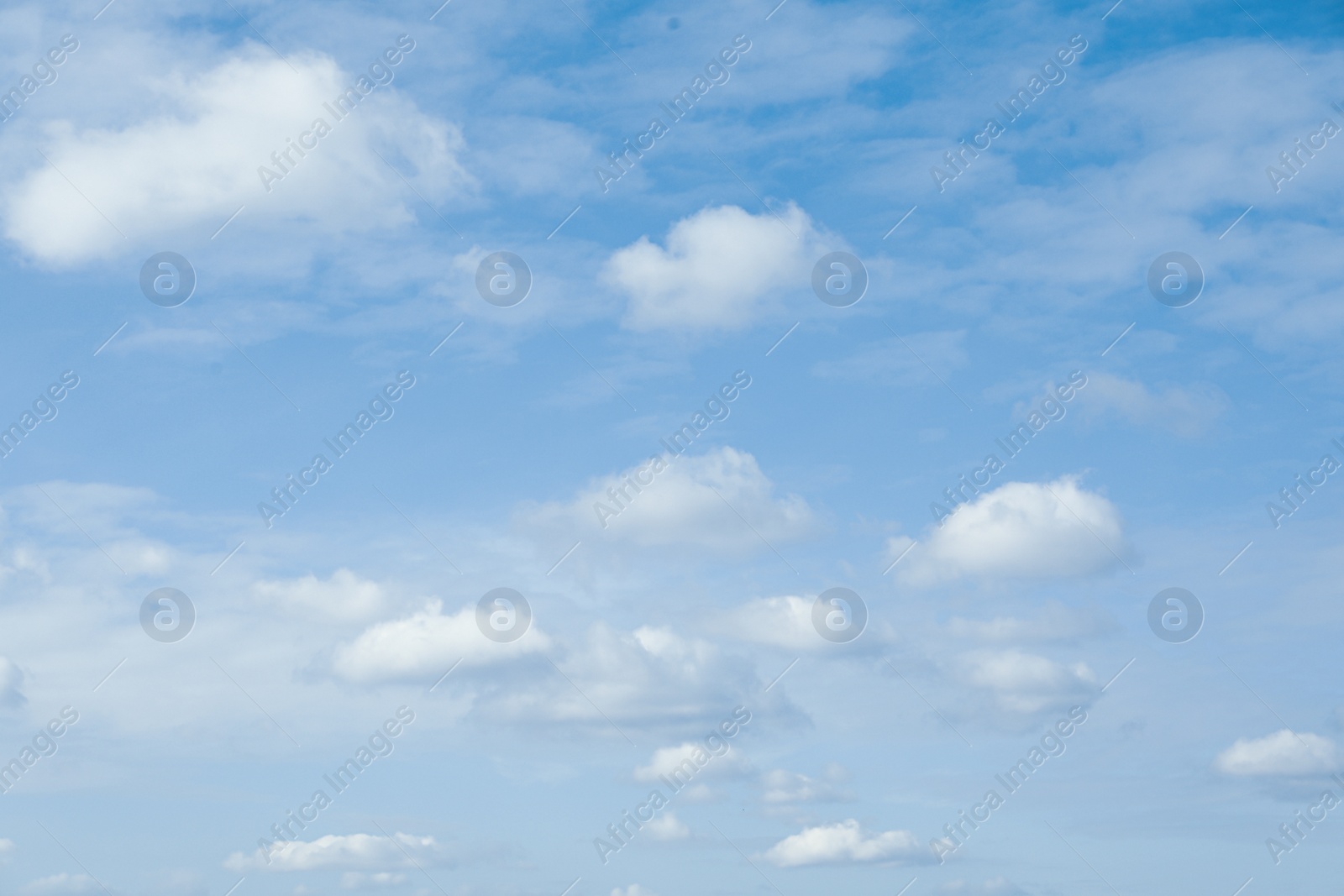 Beautiful blue sky with white clouds on sunny day Photo of Beautiful blue sky with white clouds on sunny day